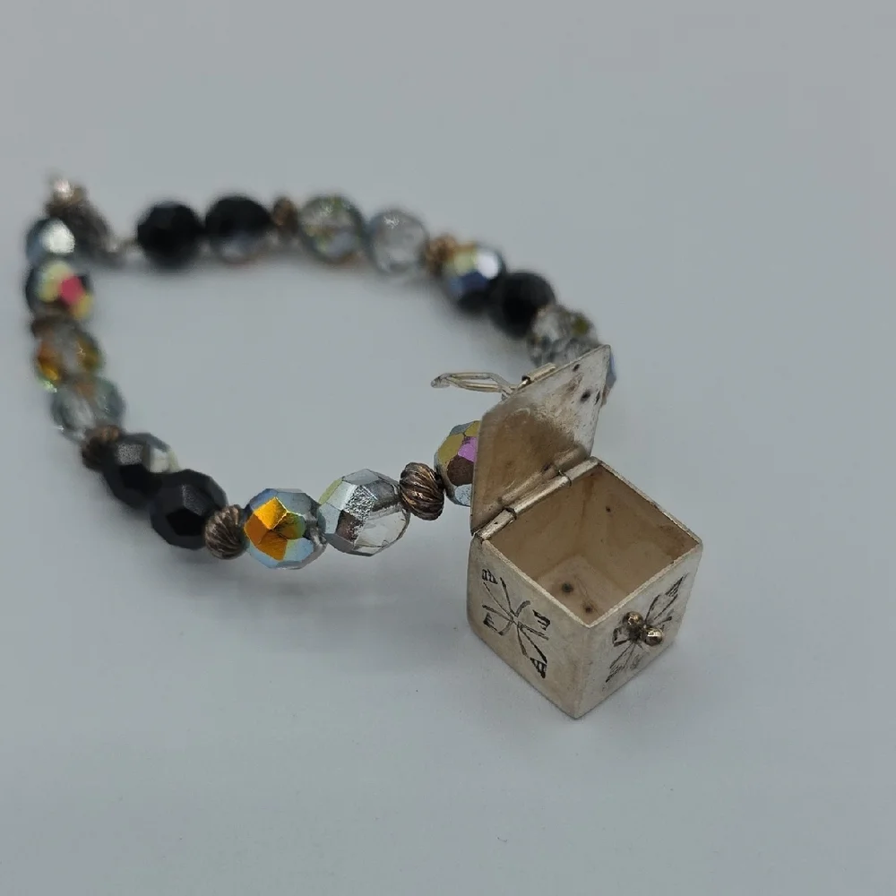 Elegant Black and Gold Charm Bracelet